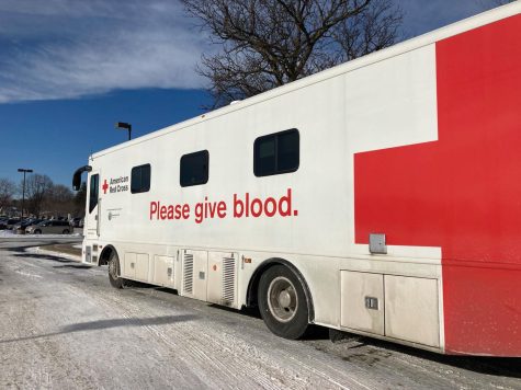 The Red Cross blood donation bus parks outside Park. The Blood Drive took place as a part of a DECA project Jan. 11.