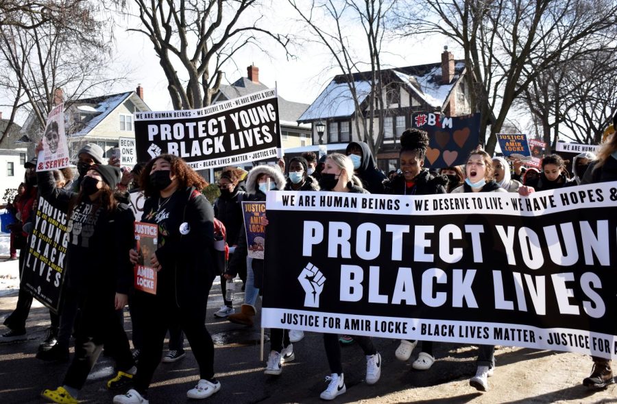 Students march to the Governor’s Residence during a walkout to protest the murder of Amir Locke. The walkout took place Feb. 8, six days after Locke was killed.