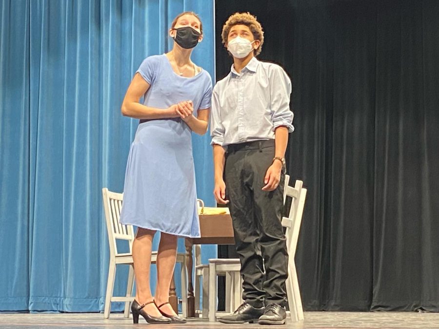 Senior Louise Marshall and freshman Miles Johnson gaze into the audience Feb. 3. During the show, the two portrayed the struggles young couples faced in the 20s.