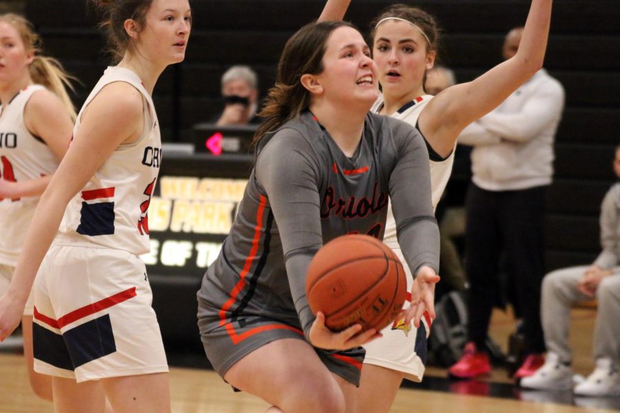 During the second half, Freshman Bella Miller drives to make a layup Feb. 11. Park lost 41-74 to Orono.