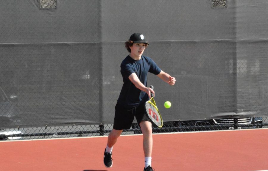 Sophomore Brennan Anderson gets ready to hit the ball. Boys tennis’ held a tournament fundraiser on May 7.