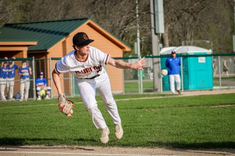 Junior Stefano Giovanelli flips the ball to first May 10. Park won against Wayzata 5-0.