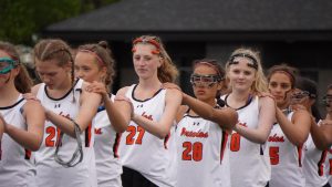 Girls Lacrosse line up together before game May 26. Girls Lacrosse win against Waconia with a 15-1 win.