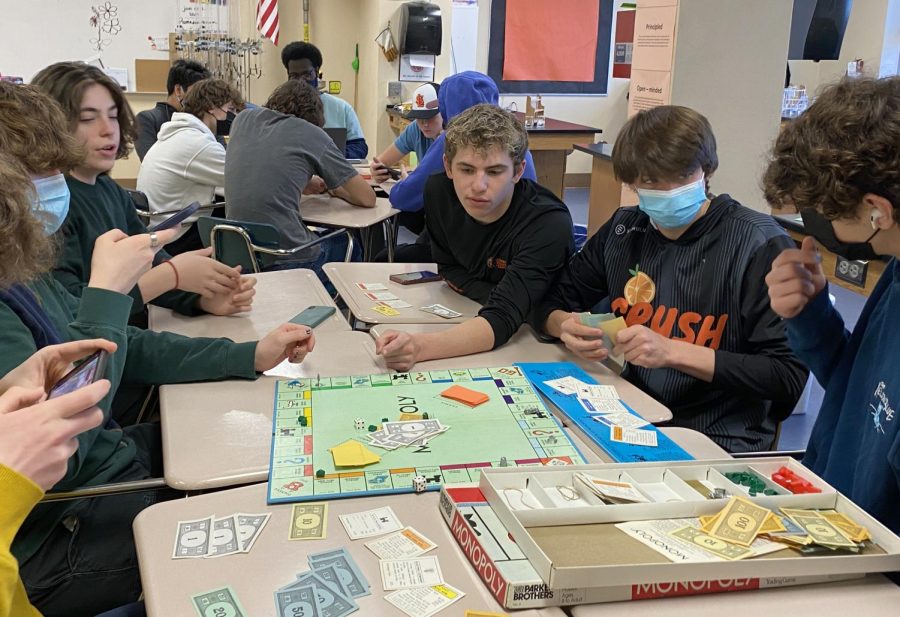 Students+play+Monopoly+in+Board+Game+%26+Uno+Action+Thursday+on+May+5th.+The+activity+happens+every+Thursday+in+A308%2C+with+Alexander+Polk.