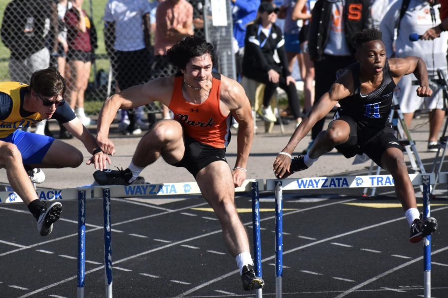 Junior James Hager charges over a hurdle June 2. Hager will compete at the State meet for the 110-meter hurdles. 