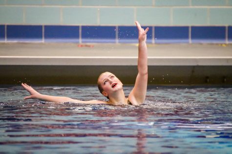 Senior Ada Turman glides out of the water during her solo May 27. Parks synchro team competed at the State meet held at the University of Minnesota Aquatic Center. 