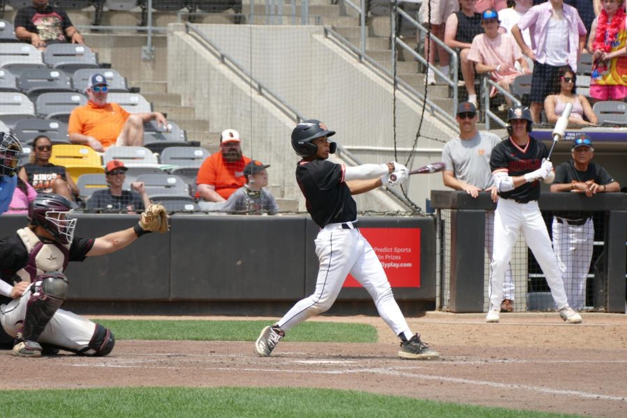 Senior Stanley Regguitni goes up to bat and swings June 14. Park lost to Maple Grove 2-5. 