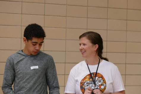 New assistant principal Alyssa Gardner talks to an incoming freshman during activity fair Sept. 1. Gardner watched as the new students checked out all the clubs . 