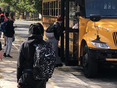 Students board bus 213 Sept. 21. On Sept. 7, the bus stopped to aid a toddler found in the street. 