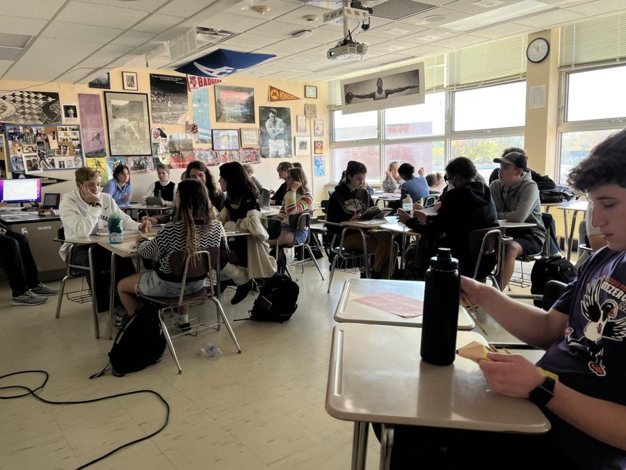 In anticipation of class starting, 40 students in Erik Ahlquists seventh hour Calculus class get materials out. This is one of many classes filled to capacity as class sizes increased due to budget cuts.  