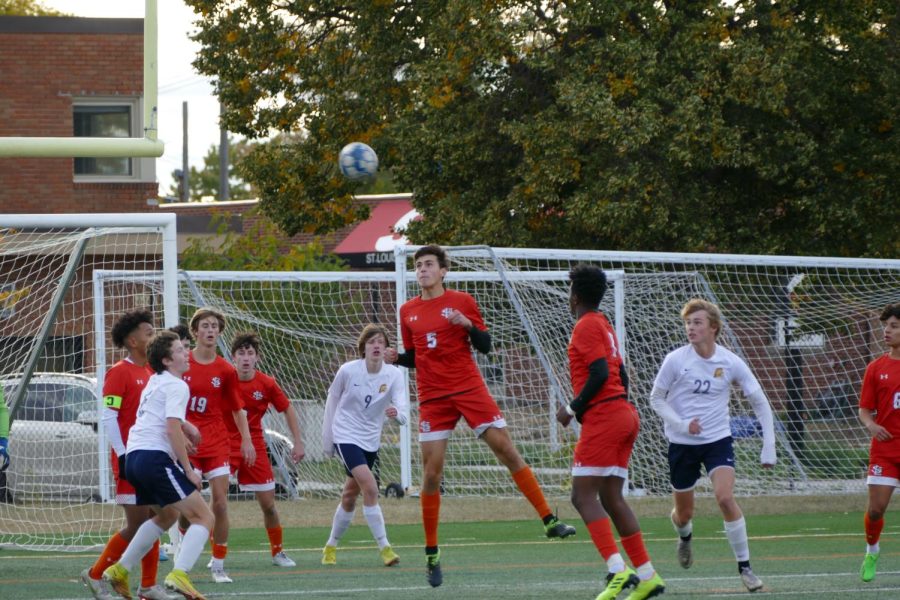  Senior Sebastian Tangelson Headbutts ball from a corner kick by the Spartans Oct. 6. Park lost 3-2 to the Spartans.