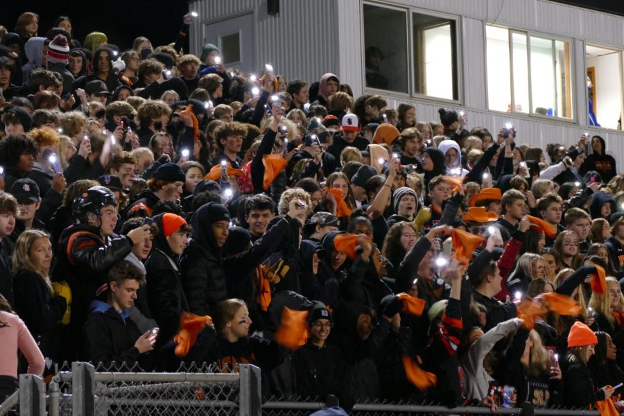 Park’s student section had a dress code of blackout for homecoming Oct. 7. Everyone received  an orange towel to twirl when cheering. Park lost to Holy Angels 34-8.