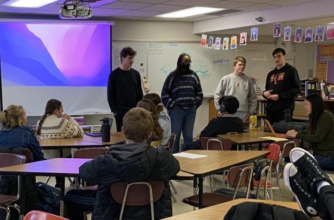 Senior leaders Issac Israel, Amira Abdirahman and Sebastian Tangleson speak to club members Dec. 7. Youth in Government is preparing for a conference at the Minnesota capitol Jan. 5.