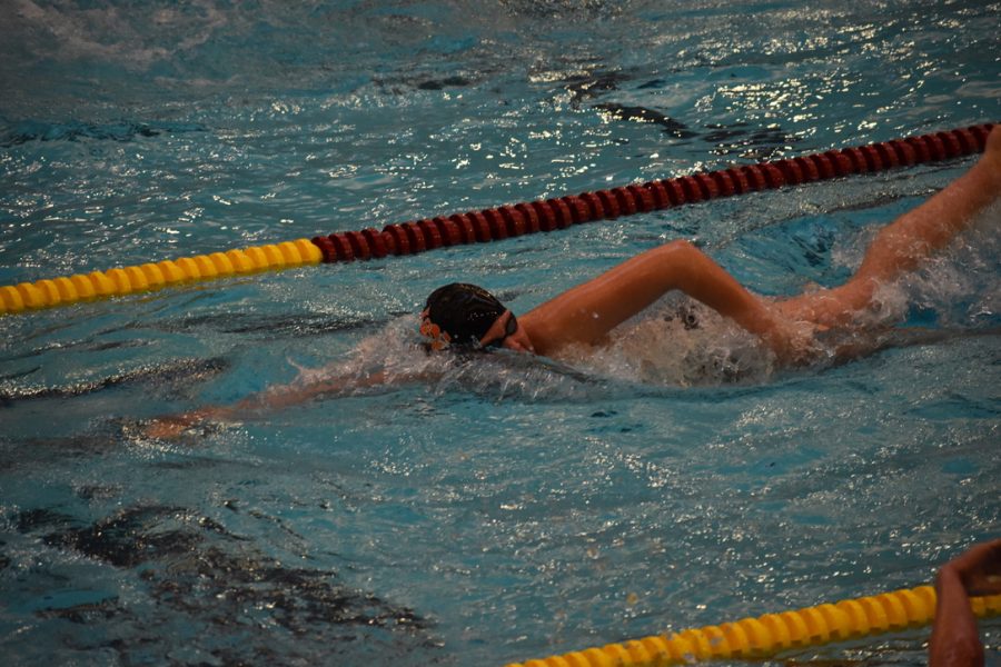 Sophomore Finn Berry swims the 200m freestyle Saturday. The boys team swam at the U of M Jan. 7.