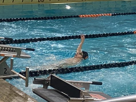7th grader Luis Dominguez swims backstroke vs Jefferson Jan. 12. Park ended up winning the meet 51-42.