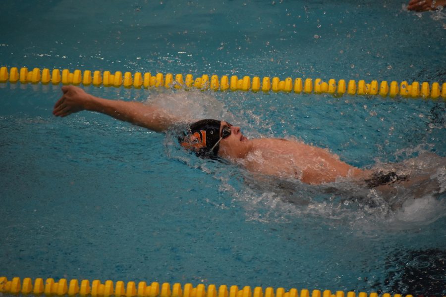 Sophomore Magnus Smith  backstrokes in the University of Minnesota pool Saturday. Park won their second meet Jan. 7.