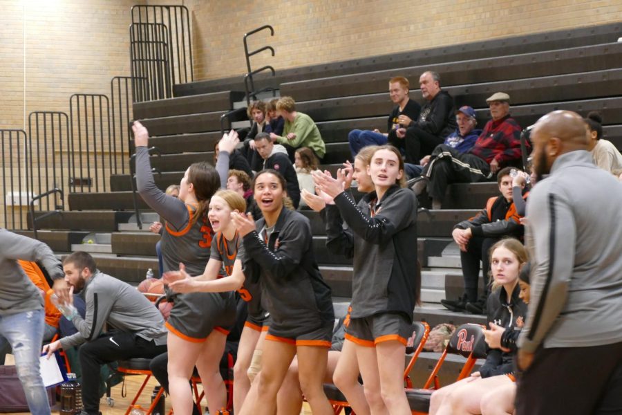 The girl’s basketball team cheer for their teammates on the court Jan. 10. 
Park’s upcoming game is Jan. 13. against Waconia.