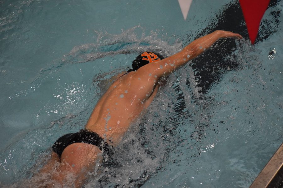 Junior Henry Salita swims the first leg of the 400 free relays. The boys team lost 95-77 in their meet Feb. 2 against Benilde-St. Margarets.