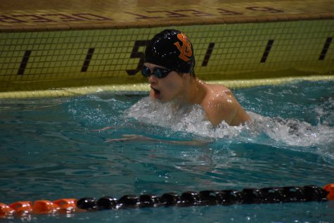 Freshman Colin Foy swims the 100 breaststroke Feb. 9. The boys’ team beat Waconia 52-42 Thursday.