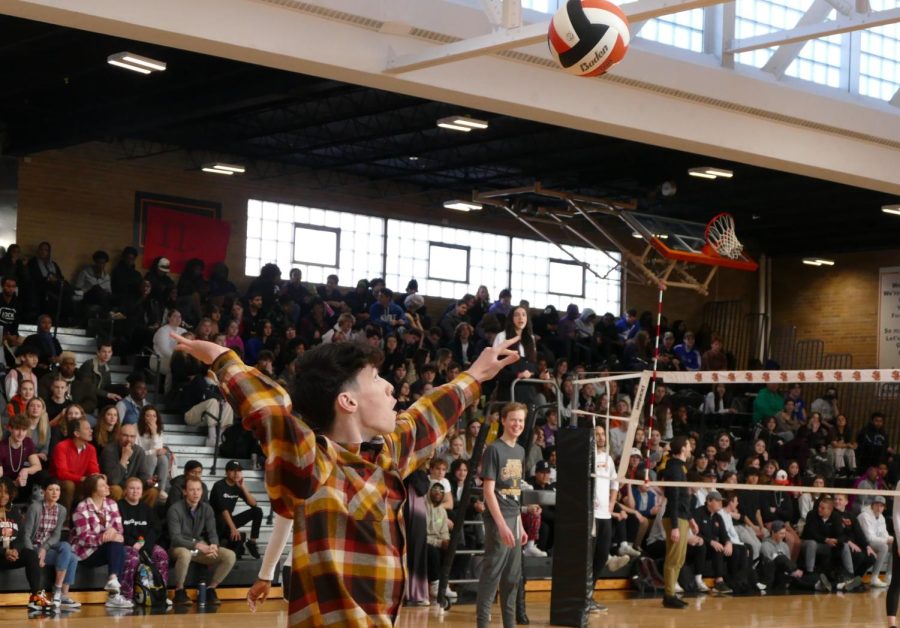 Senior Daniel Bevell makes the first serve of the game Feb. 10. Park students lost to the teachers 25-22.