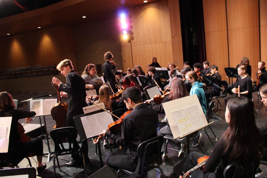 Parks orchestra preforms at Chaska High School Wednesday. The players set up and prepare to play some music Feb. 8.