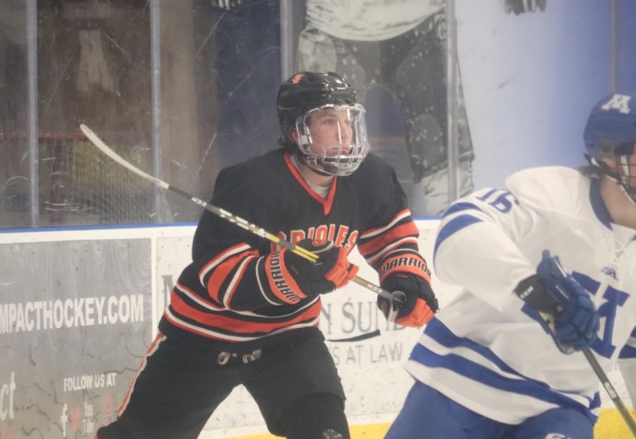Junior Griffin Krone focuses on the puck. The Orioles took on the Skippers Feb. 9. 
