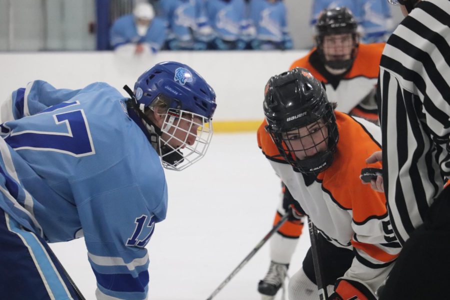 Junior Sam Fuller faces off for the puck Feb. 16. The Orioles beat the Jaguars 3-1.