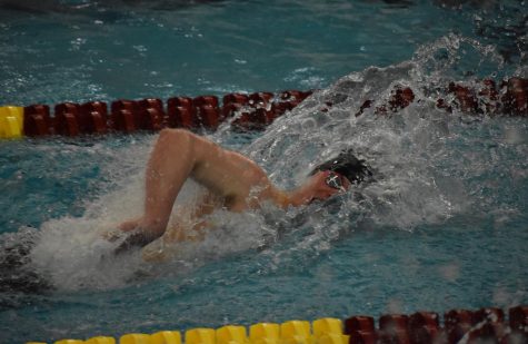 Senior Miles Nordling swims the 200 freestyle at state March 4. Nordling broke a school record after placing sixth in the event.