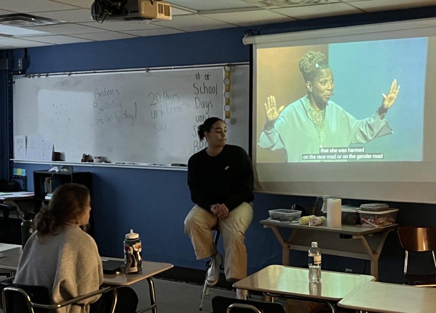 Sophomores Sela Myers and Alicia Mainjeni watch a Ted Talk about intersectionality March 16. Girls United met to have a conversation about the intersection of racism and sexism.