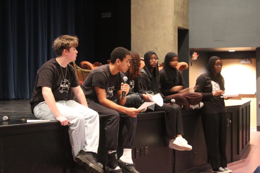 Juniors Will Gohman and Calvin Zimmerman listen as students voice their thoughts during a SOAR-hosted discussion March 22. SOAR led students through addressing questions regarding the affects police brutality on themselves and the community. 