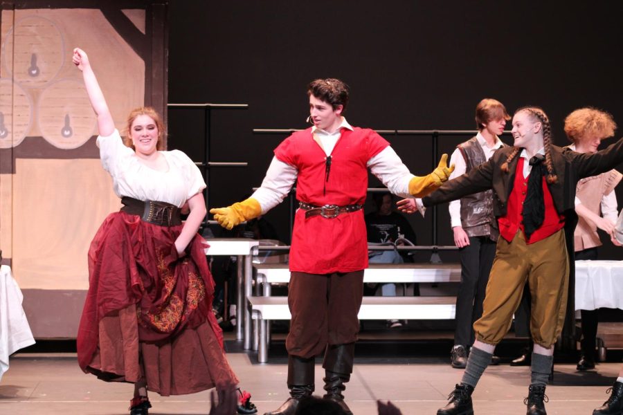 Rose Huse (Babette) dances with Declan Gaines (Gaston) and Abigail Baudhuin (LeFou) March 18. They sing “Gaston” with the cast.