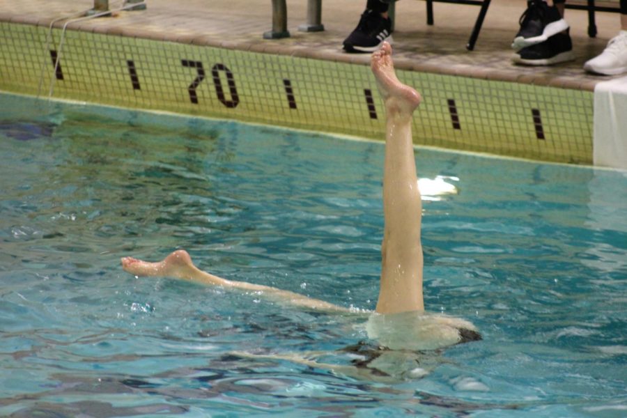 Senior captain Leila Campbell does her walkover figure March 23. The girls synchro team beat Richfield 22-7 last Thursday.