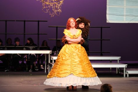 Gwen Rockler-Gladen and Ronan Guevara embrace onstage March 18. The pair slow dance to the song Beauty and the Beast.