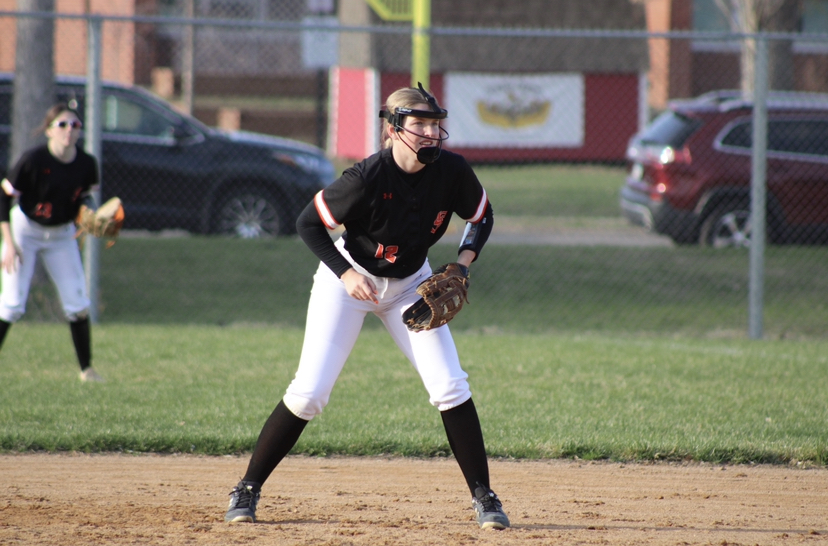 Senior Kamryn Halley prepares to receive a ball at second base April 19. Park’s softball team continued to compete despite the low temperatures.