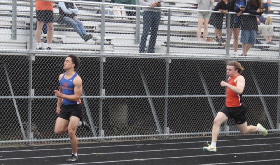 Junior Sam Pliner runs in the 100 meter event on May 9. Pliner placed 17th in the 100 meter and Park’s boys team placed fifth overall. 