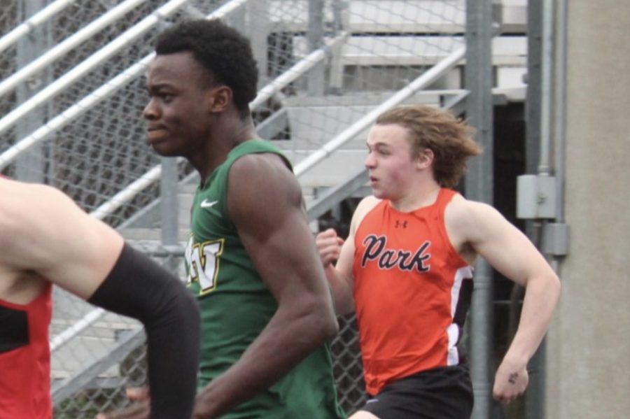 Sam Pliner sprints to finish the 100 meter event May 9. Park’s boys team raced against ten other teams to come in fifth overall. 