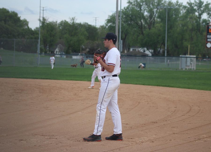 Senior Zach Helfman plays first base against New Prague May 10. Helfman will play football for the University of Minnesota Duluth football team this upcoming school year. 