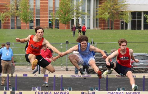 Senior Sebastian Tangleson runs the 110 meter hurdles May 17. Tangleson got fourth overall out of eight in the conference at Chaska High School.
