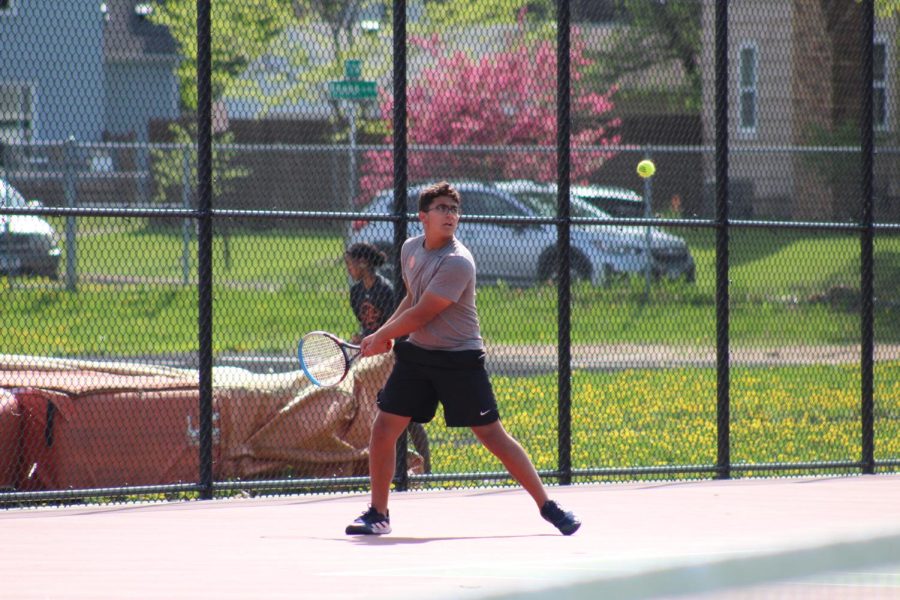 Sophomore Josh Fink hits the tennis ball back to his opponent May 15. Park played hard against Minneapolis South, and finished their regular season off with a win of 5-2.