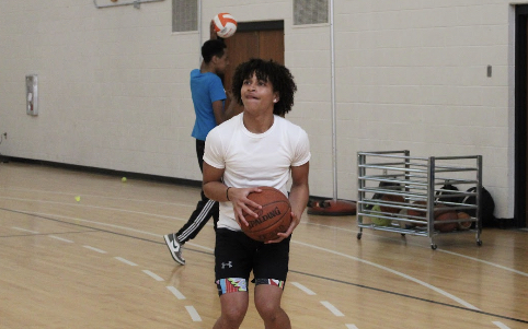 Junior Drey Whitfield plays basketball in the gym June 1. Boys volleyball is coming to Park in the fall. 
