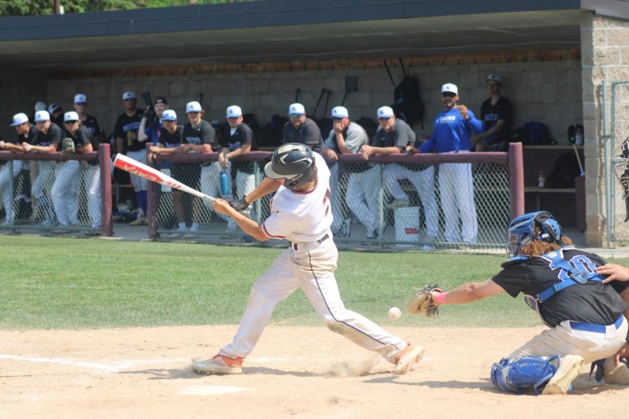 Senior Eli Puchner swings and misses on June 3. Park found success against Hopkins after a 10-6 win to advance to the section semi-final.