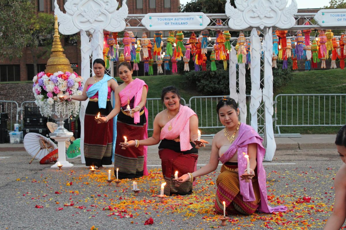 Thai dancers perform the candle dance at the MinnesoThai festival Sept. 16. Performed on the first night of the festival