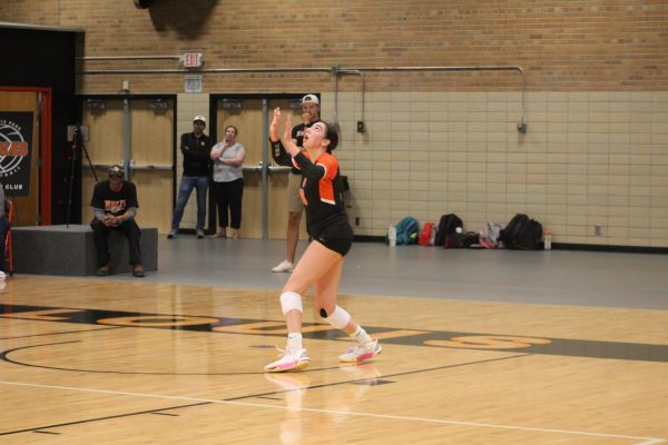 Junior Huston Samoy serves for Park Sept. 20th. Samoy serves the ball against Waconia, but her contribution fails to put them in the lead.