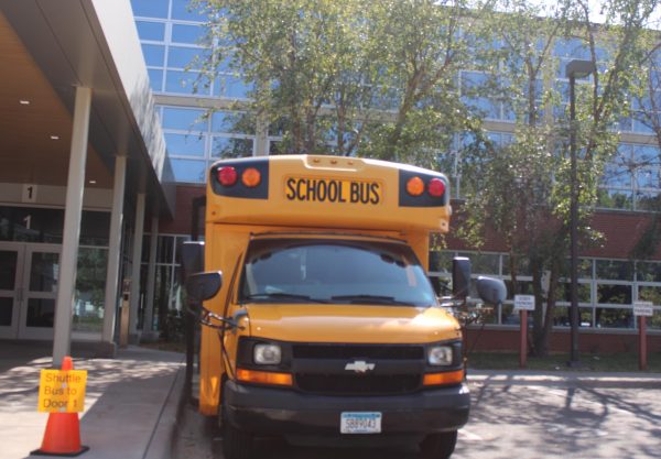 Shuttled bus stationed outside door 1 on Sep. 14. Shuttle bus provides transportation for immobilized students.