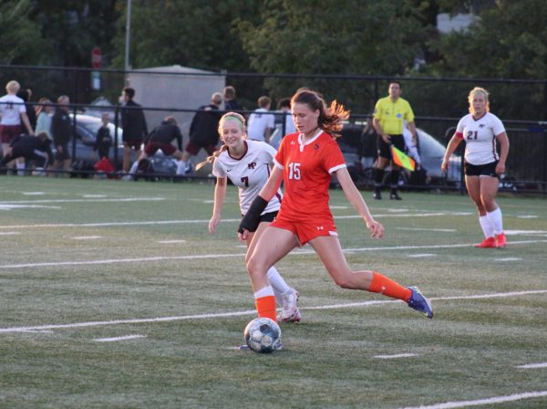 Sophomore Audrey Martin strikes the ball on Sept 28. Park Girls Soccer ended up defeating New Prague 4-0. 