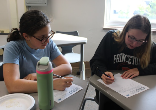 Sophmores Susannah Israel and Madi Abelson, write letters that they will receive and open next year. This is the spirit of Yom Kippur which follows the Jewish new year. 