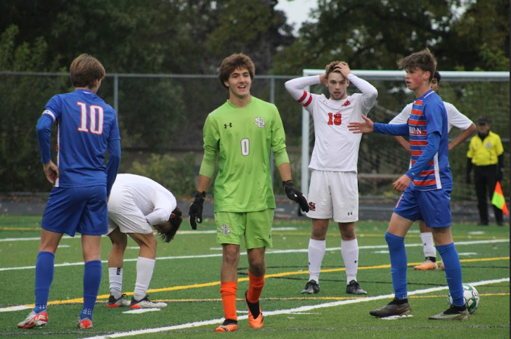 Senior Wesley Smith receives a red card, resulting in being removed from the game Oct. 12. Park boys soccer team lost 6-0 to Washburn, ending their season