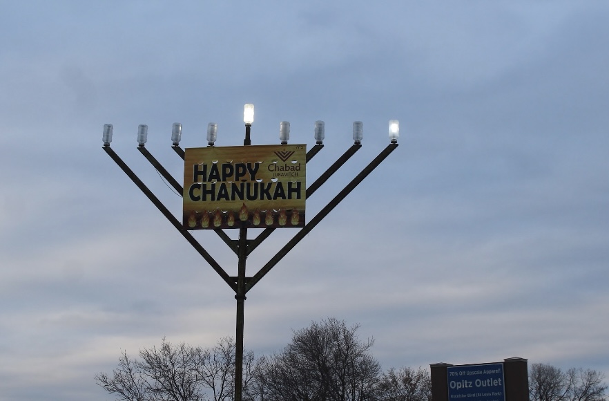 Park puts up a 12-foot Hanukkah menorah to represent which day of Hanukkah it is. This is one of the many ways Park celebrates Hanukkah.