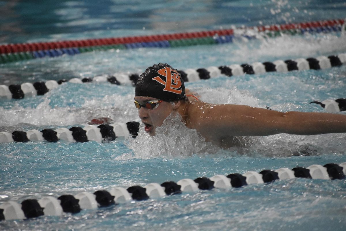 Eighth-grader Axel Smith swims 100 fly on  Thursday. The boys team went up against Orono on Jan 25.