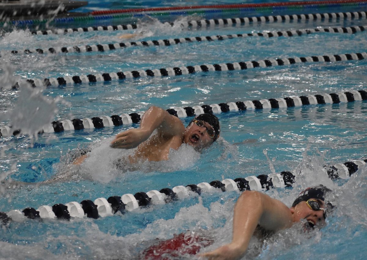Eighth-grader Axel Smith swims the 400 free relay Jan. 25. Smith competed as part of a relay on Thursday.